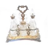 A Victorian silver seven bottle cruet set,