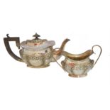 An Edwardian silver teapot and sugar bowl,
