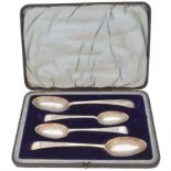A cased set of four Georgian serving spoons,