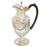 A George IV silver hot water jug,