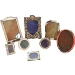 A selection of early 20th century silver photograph frames,