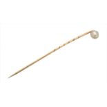 A pearl stickpin,