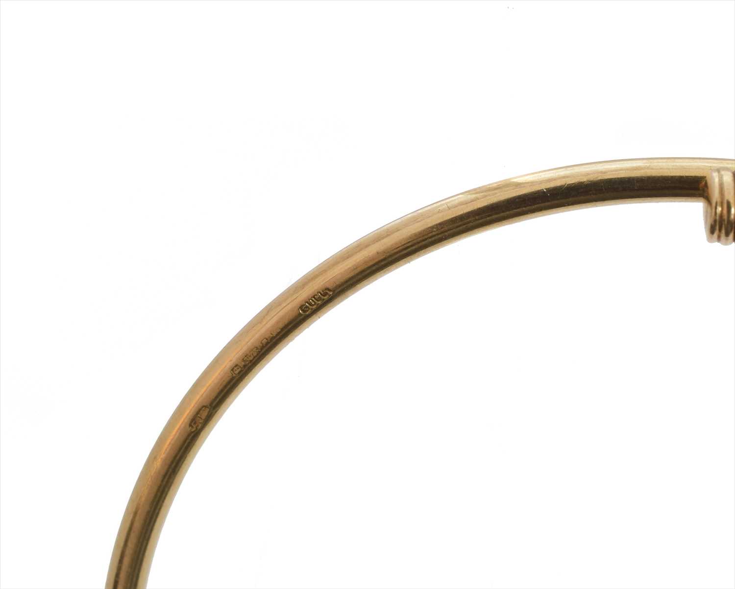 A 9ct gold Gucci bangle, - Image 2 of 6