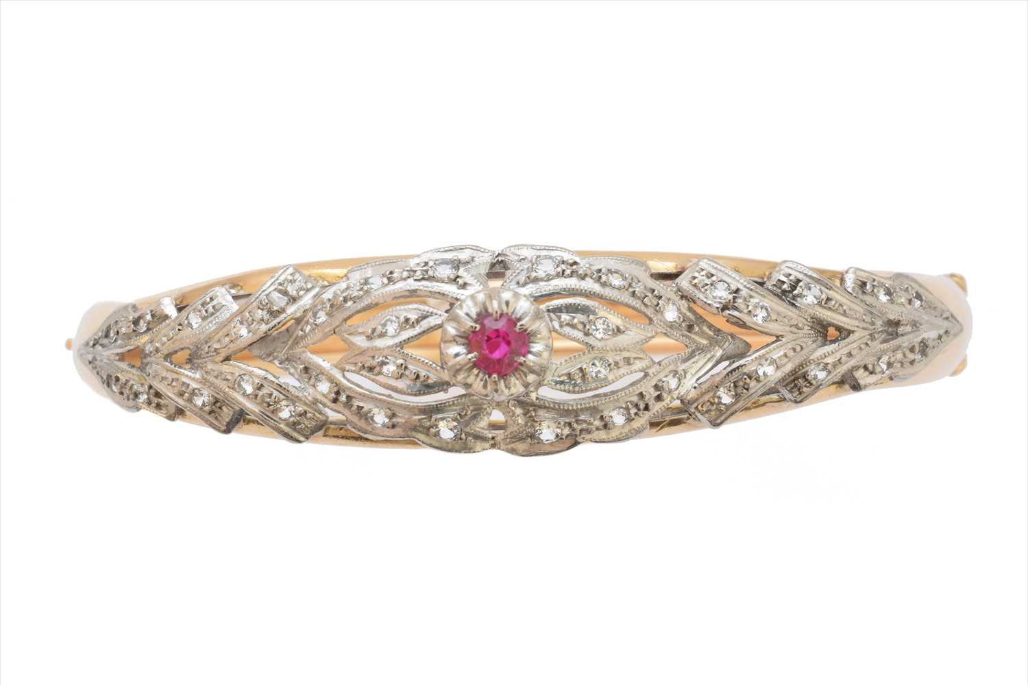 A ruby and diamond hinged bangle,