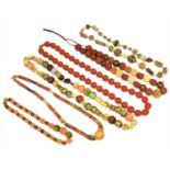 A selection of beads, to include Chinese lacquered beads, trading beads and various other strands (