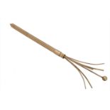 A 9ct gold cocktail swizzle stick,