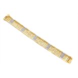 An 18ct gold diamond bracelet by Roberto Coin,