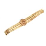 An 18ct gold ruby bracelet,