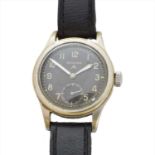 A 1940s stainless steel Record military watch,