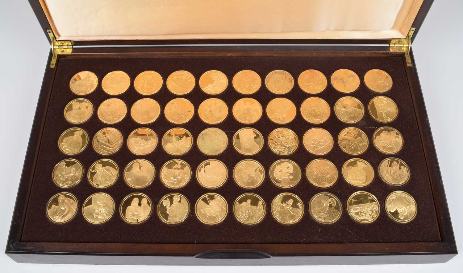 Cased "Les Chefs - D'Oeuvre De L'Impressionnisme", with 50 silver gilt medallions.