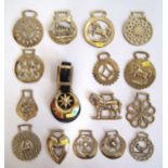 Sixteen Victorian horse brasses.