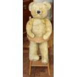 Dolls metamorphic high chair and 1950's Teddy bear with movable limbs