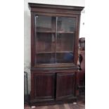 19th century mahogany book case on two door base 108cm wide