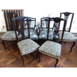 A set of four Edwardian splat-back dining chairs and a pair of similar elbow chairs