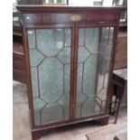Early 20th century mock Sheraton design glazed display cabinet.