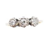 A diamond three stone ring,