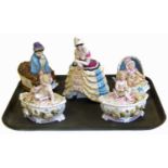 A pair of Contra Boehm figure trinket or tobacco boxes, together with three others