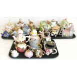 A quantity of decorative tea pots to include Sadler Christopher Wren, Chez frogs, Leonardo, Annie Ro