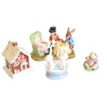 A mixed lot of ceramics to include Beswick "Mad Hatters Tea Party", Royal Albert Jeremy Fisher, Coal