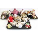 A quantity of decorative tea pots , Midwinter Bali Hi, Woods elephant, Sadler Arthur Wood Coronation