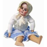 19th century doll with a porcelain head and moving eyes, made by "Handwerk"