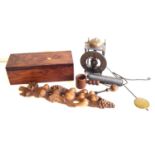 Rosewood box, nut cracker, carved wall ornament, and a lantern clock