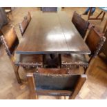 Oak refectory dining table with single drop leaf and 7 Cromwellian style dinning chairs (1 carver) w