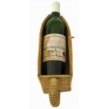 Bottle 1964 Château Grand St. Julien wine, bottled by Stowells in wicker pouring basket