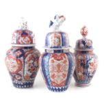 Three similar Japanese lidded vases
