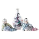 Pair of Chinese porcelain figures and a snuff bottle,
