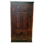 George III oak floor standing corner cupboard