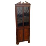 Edwardian mahogany floor standing double corner cupboard