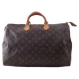 A Louis Vuitton monogram Speedy 40 handbag,