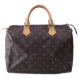A Louis Vuitton monogram Speedy 30 handbag,