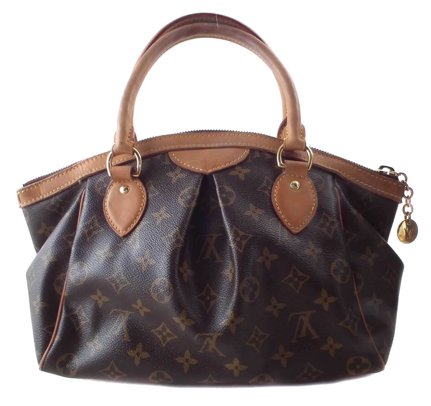 A Louis Vuitton Monogram Tivoli PM handbag,