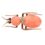 A coral bug brooch,