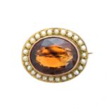 A citrine and split pearl brooch,