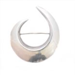 A Georg Jensen silver crescent brooch,