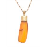 An amber pendant,