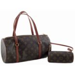 A Louis Vuitton Monogram Papillon handbag and pouch,