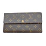 A Louis Vuitton monogram Sarah wallet,