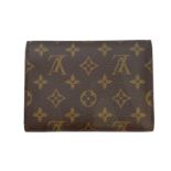 A Louis Vuitton Monogram Porte-Tresor Etui Papier wallet,