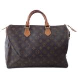 A Louis Vuitton monogram Speedy 35 handbag,