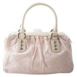 A Louis Vuitton Pink Monogram Trapeze PM Handbag,