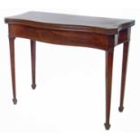 Mid 19th century serpentine front fold-over tea table.