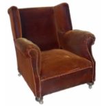 Victorian upholstered wing-back armchair.