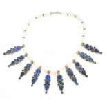 A cultured pearl and lapis lazuli necklace,