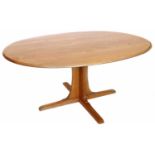 Ercol ash and elm oval dining table.