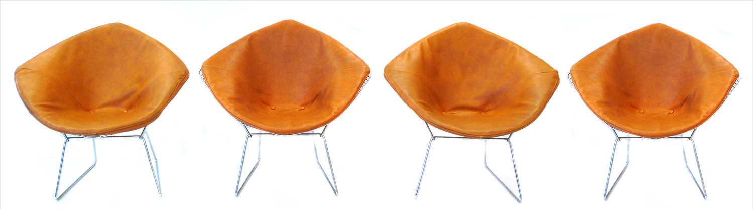 Four 1970's diamond shaped chromium plated wire-work chairs.