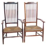 Pair of beech frame arts and crafts design open arm chairs.